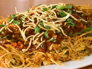 Vegetable Schezwan Triple Rice